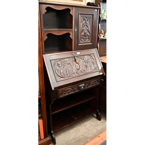 140 - A Victorian carved mahogany 'green man' bureau, 76 x 40 x 165 cm high