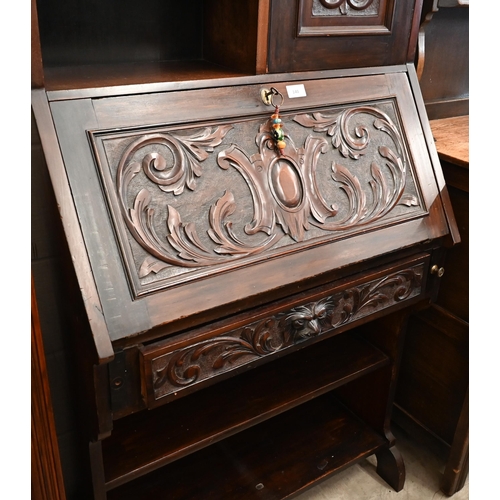 140 - A Victorian carved mahogany 'green man' bureau, 76 x 40 x 165 cm high