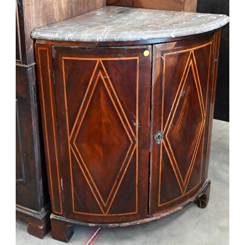 143 - #A French kingwood inlaid marble top corner cupboard with two doors, standing on bracket feet, 80 cm... 