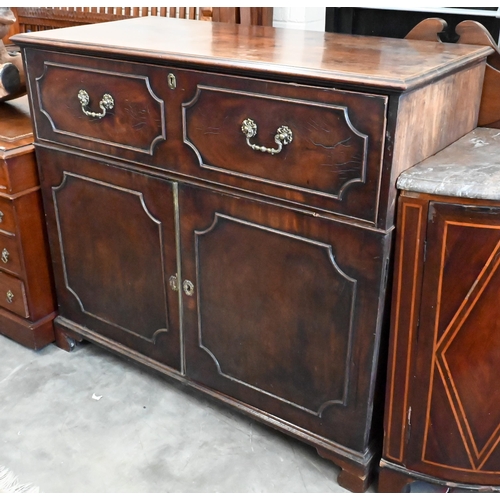 146 - A Regency mahogany secretaire with fitted interior and panelled cupboards raised on bracket feet, 12... 