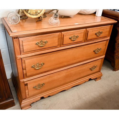 152 - A Georgian style chest of three long drawers on shaped bracket feet, 110 cm wide x 48 cm deep x 84 c... 