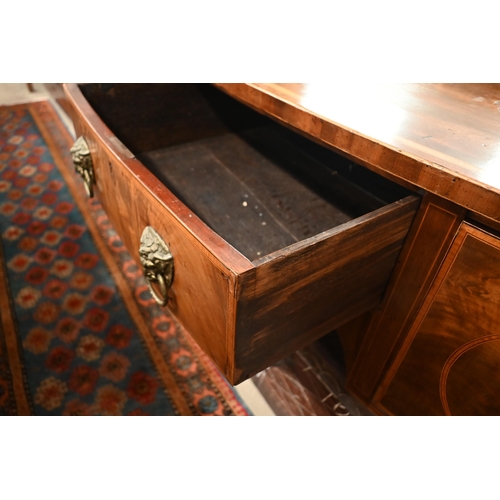 154 - A George III mahogany bowfront sideboard on tapering square supports with spade feet, 150 x 70 x 92 ... 