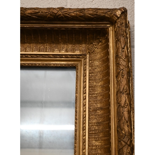 155 - An antique rectangular mirror in moulded giltwood and gesso frame, a/f, 140 x 96 cm