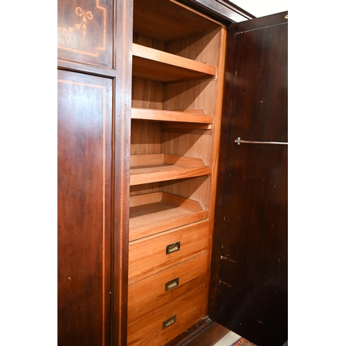 157 - Edwardian Sheraton revival inlaid mahogany compactum wardrobe mirrored and panelled doors enclosing ... 