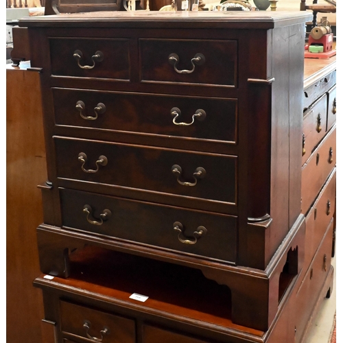 166 - A pair of small mahogany Georgian style chests each with two short over three long drawers on bracke... 