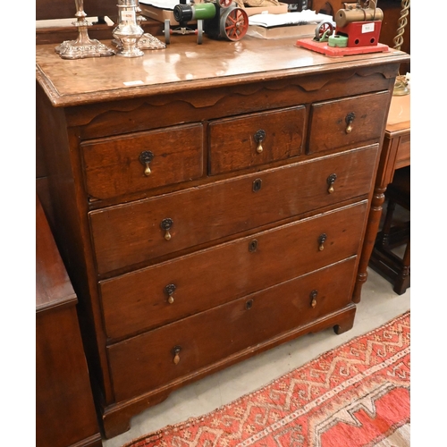 167 - An 18th century oak chest of three short over three long graduating drawers on shaped bracket feet, ... 