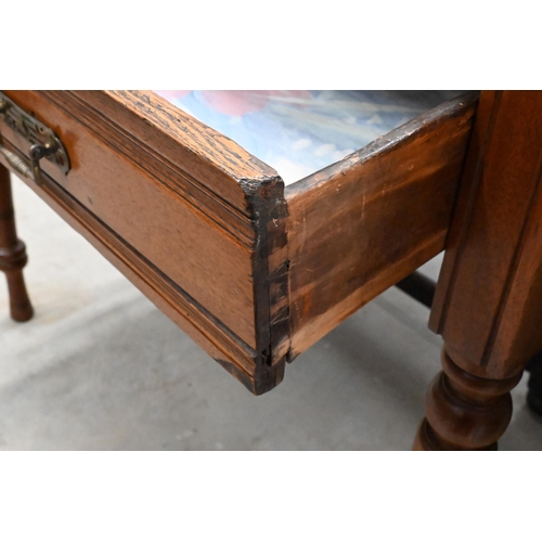 168 - # An Edwardian writing table with gilt tooled tan leather top and frieze drawer raised on turned sup... 