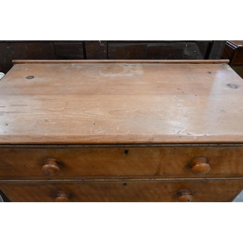 169 - A Georgian birch and pine chest of three long drawers with turned handles and bun feet, 100 x 50 x 8... 