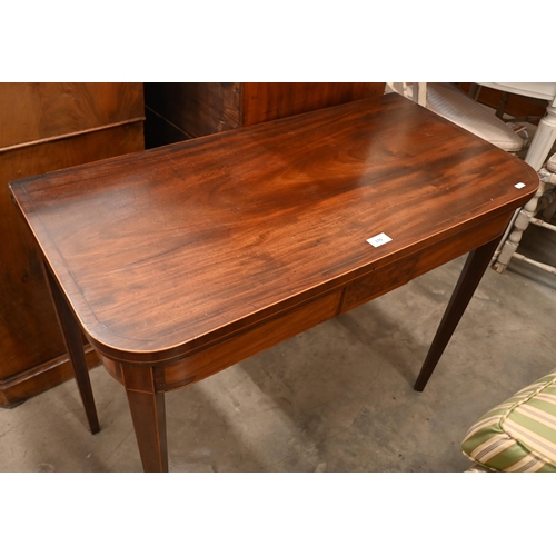 175 - A 19th century mahogany folding card table with baize lining and tapering square supports, 92 x 45 x... 