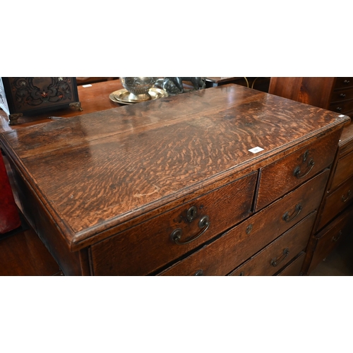 178 - An antique 18th century oak chest of two short over three long drawers raised on bracket feet, 96 cm... 