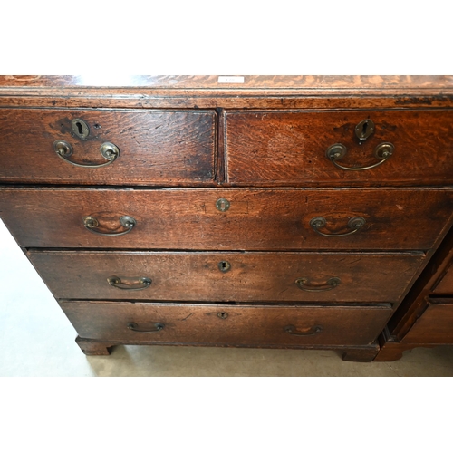 178 - An antique 18th century oak chest of two short over three long drawers raised on bracket feet, 96 cm... 