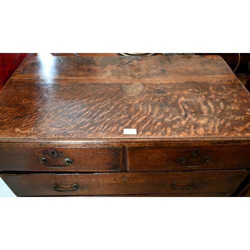 178 - An antique 18th century oak chest of two short over three long drawers raised on bracket feet, 96 cm... 