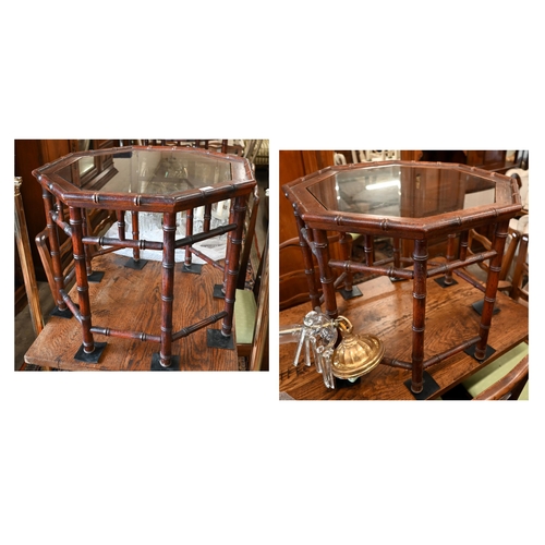 189 - A pair of simulated bamboo stained hardwood octagonal side/coffee tables with inset glass top, 65 cm... 