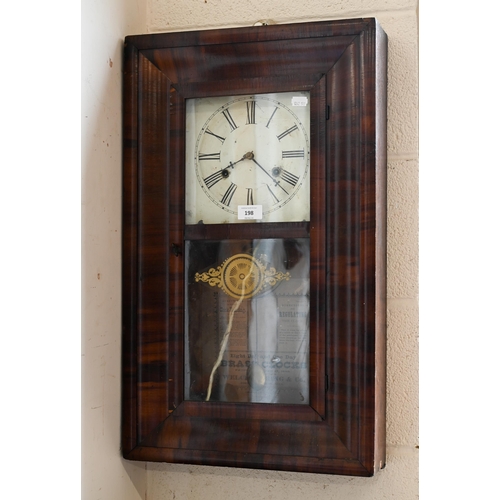 198 - # Antique walnut American ogee wall clock with 'Welch, Spring & Co' paper label c/w two weights ... 