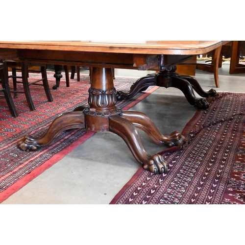 204 - A Victorian mahogany telescopic twin-pad extending dining table with three leaves, turned columns wi... 