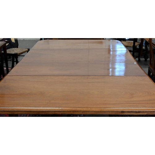 204 - A Victorian mahogany telescopic twin-pad extending dining table with three leaves, turned columns wi... 