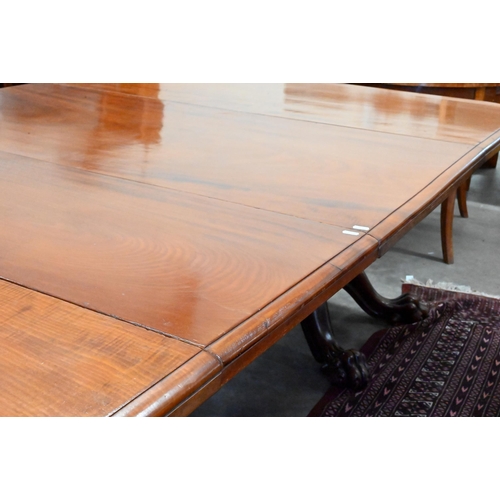 204 - A Victorian mahogany telescopic twin-pad extending dining table with three leaves, turned columns wi... 