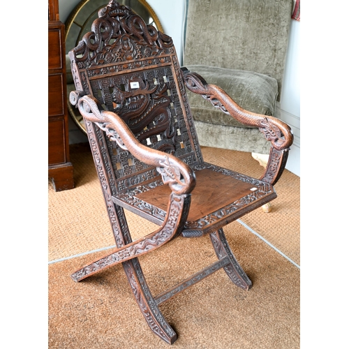 211 - An antique Chinese carved and moulded dragon back chair with hinged seat, a/f