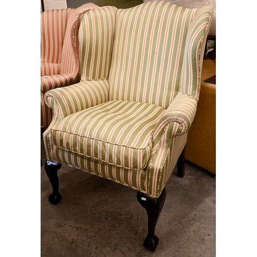 219 - A Georgian style mahogany framed wingback armchair with green and cream striped fabric and cabriole ... 