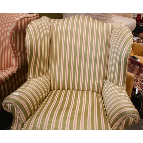 219 - A Georgian style mahogany framed wingback armchair with green and cream striped fabric and cabriole ... 