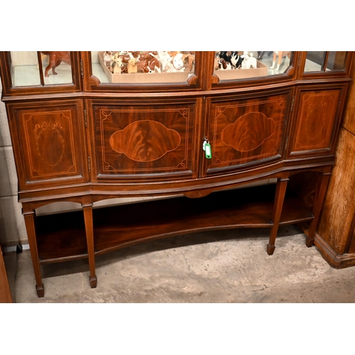 220 - An Edwardian Sheraton revival inlaid mahogany display cabinet on tapering square supports with spade... 