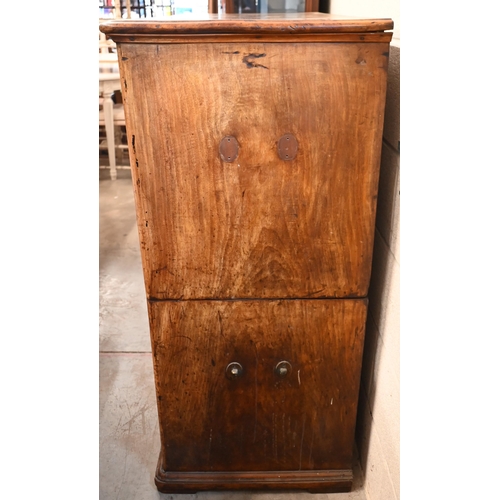 221 - A 19th century Anglo Indian camphorwood campagin chest of two short and three long drawers in two se... 