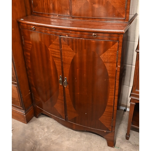 222 - # A mahogany bowfront drinks cabinet with fitted interior and central pull-out slide, 80 x 50 x 186 ... 