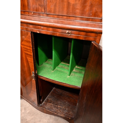 222 - # A mahogany bowfront drinks cabinet with fitted interior and central pull-out slide, 80 x 50 x 186 ... 