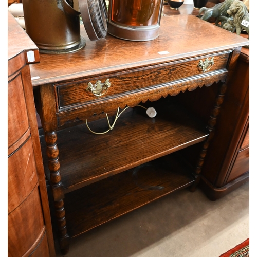 225 - An early 20th century oak buffet with single drawer and open shelves and bobbin turned supports, 92 ... 