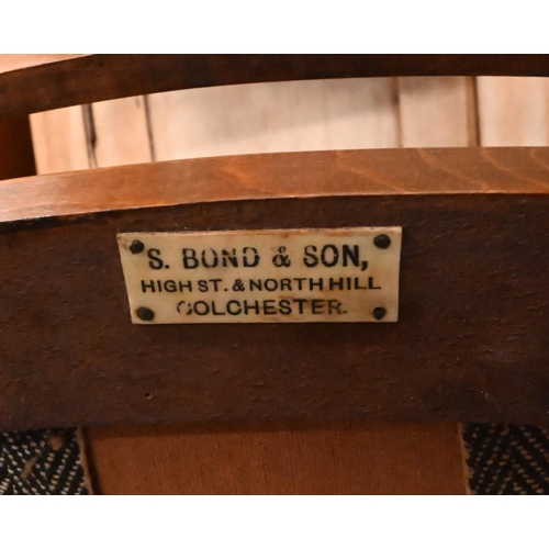 234 - S Bond & Son - An early 20th century walnut parlour suite comprising two seater settle, pair of ... 