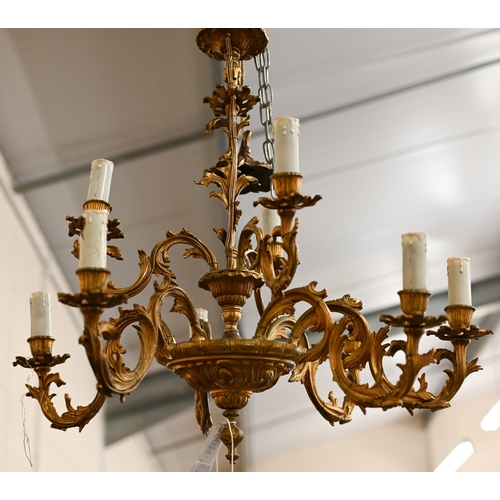 235 - A Continental two-tier gilt metal chandelier/electrolier of foliate nine branch design, 55 cm high