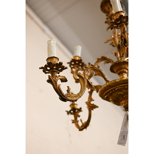 235 - A Continental two-tier gilt metal chandelier/electrolier of foliate nine branch design, 55 cm high