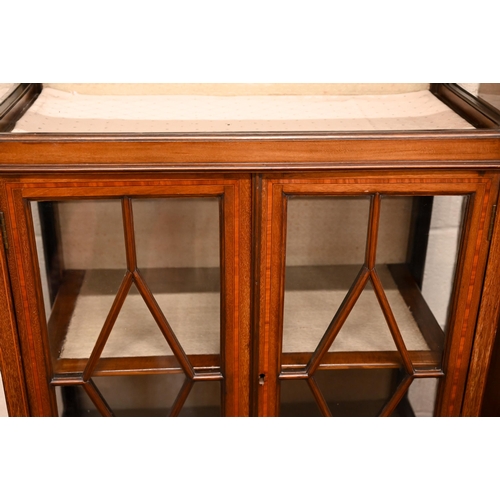 236 - An Edwardian inlaid walnut and glazed vitrine display cabinet on short tapering square supports, 76 ... 