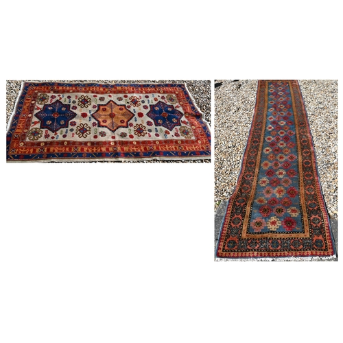 245 - A Caucasian geometric design blue ground runner, 323 x 70 cm to/w a Turkish star medallion cream gro... 