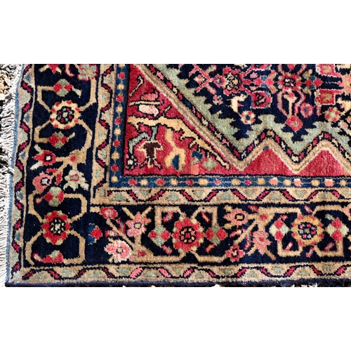 257 - A Persian Baluchi rug, double medallion on blue/brown ground, 167 x 98 cm to/w a Persian Hamadan rug... 