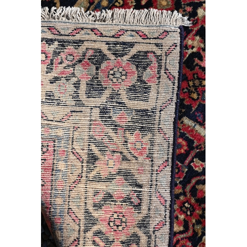 257 - A Persian Baluchi rug, double medallion on blue/brown ground, 167 x 98 cm to/w a Persian Hamadan rug... 