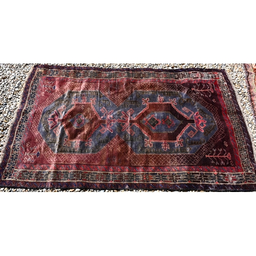 257 - A Persian Baluchi rug, double medallion on blue/brown ground, 167 x 98 cm to/w a Persian Hamadan rug... 