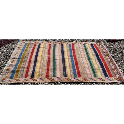 260 - A vintage multi-coloured strip design Kilim, 220 x 130cm