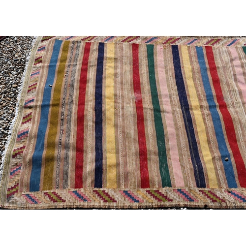 260 - A vintage multi-coloured strip design Kilim, 220 x 130cm