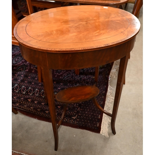 263 - # An Edwardian rosewood two-tier kidney shaped occasional table with inlaid musical instrument carto... 