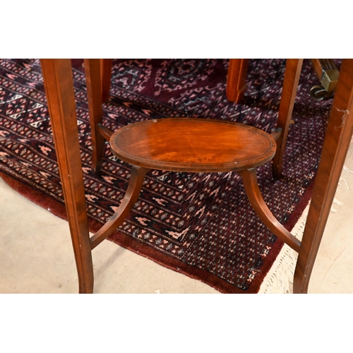 263 - # An Edwardian rosewood two-tier kidney shaped occasional table with inlaid musical instrument carto... 