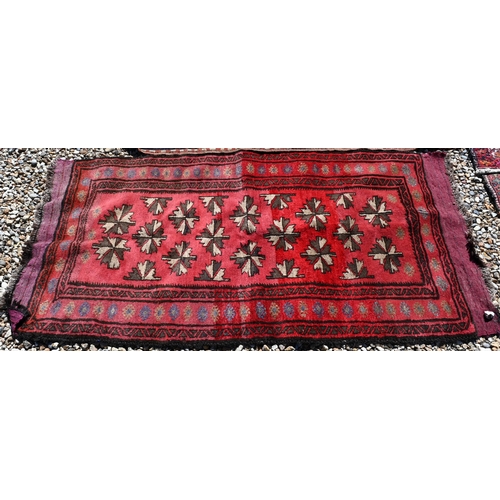 278 - Afghan red ground prayer rug, 156 x 80 cm to/w two Persian baluch rugs, 177 x 90 and 156 x 80 cm (3)