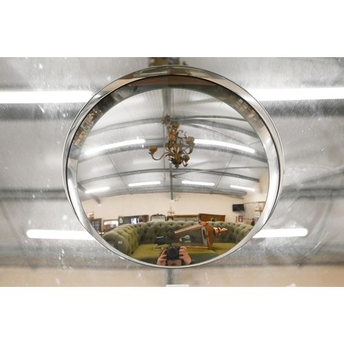 281 - # A contemporary circular wall mirror with recessed convex centre, 90 cm diam