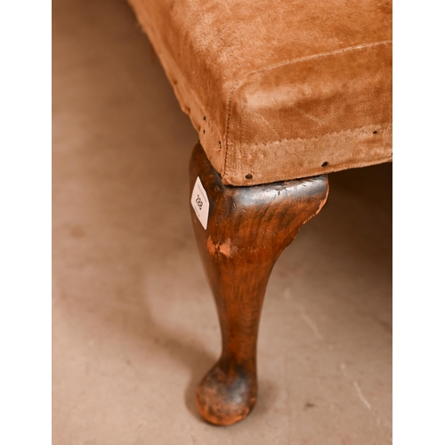 288 - An Edwardian walnut framed fender stool, old dralon upholstery and pad footed cabriole supports, 136... 