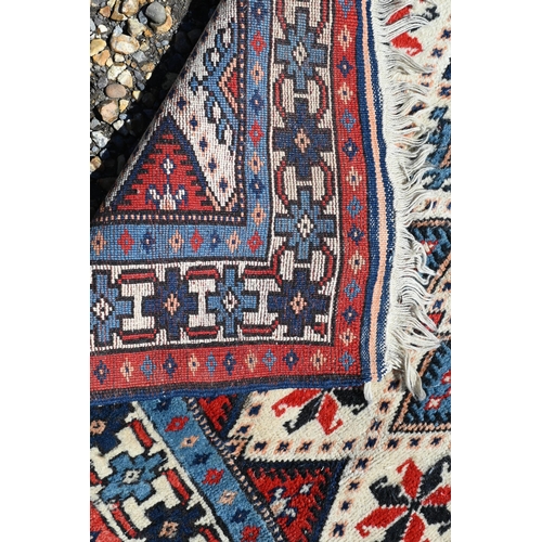 290 - An Afghan Balouch pictorial war rug with urban landscape design, 125 x 77 cm to/w Turkish geometric ... 