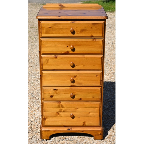 299 - A stained pine (possibly Ducal) bedroom furniture suite comprising six drawer tallboy 60 x 44 x 115 ... 