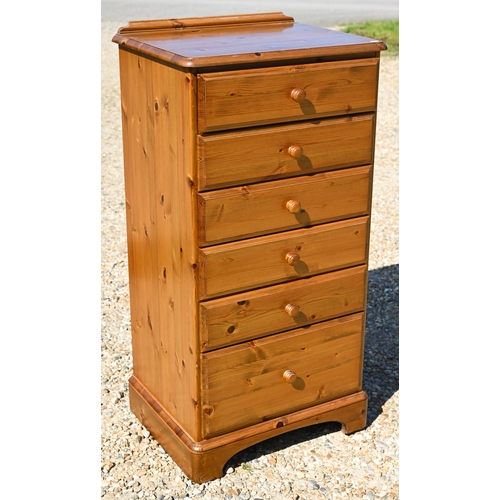 299 - A stained pine (possibly Ducal) bedroom furniture suite comprising six drawer tallboy 60 x 44 x 115 ... 