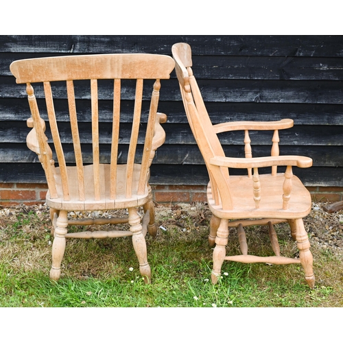 305 - A pair of beech Windsor armchairs (2)