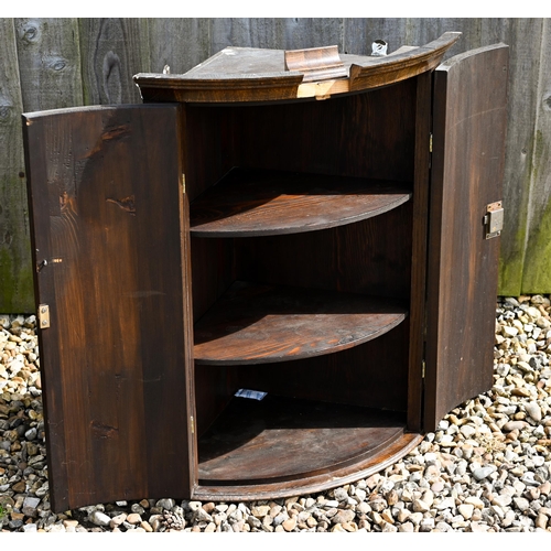 307 - A pair of small antique oak cupboards with blind fret cut panelled doors, 26 x 18 x 46 cm high to/w ... 