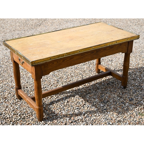 315 - A Victorian pine scullery table with brass mounted overlaid top and drawer to each end, raised on tu... 